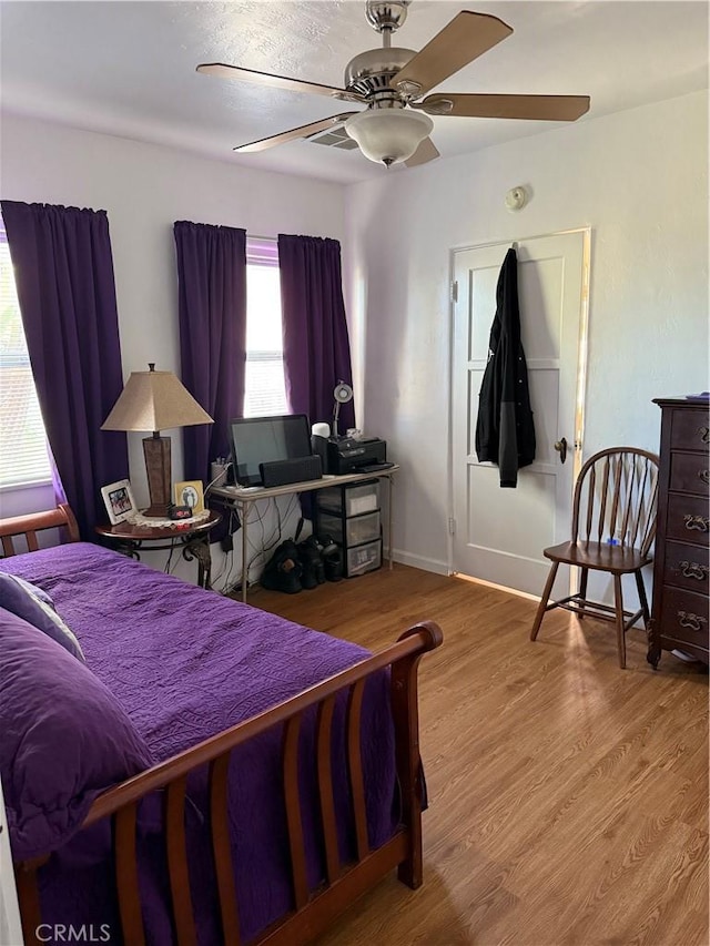 34662 Turner Ln, Yucaipa, CA 92399 - bedroom with wood finished floors, a ceiling fan, baseboards, and an office area