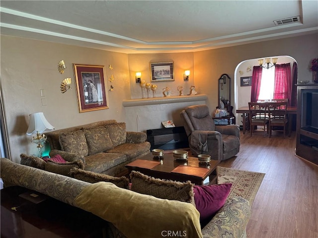 34662 Turner Ln, Yucaipa, CA 92399 - living area with a raised ceiling, arched walkways, and wood finished floors