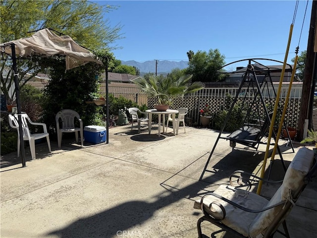 34662 Turner Ln, Yucaipa, CA 92399 - view of patio / terrace featuring a fenced backyard and a mountain view