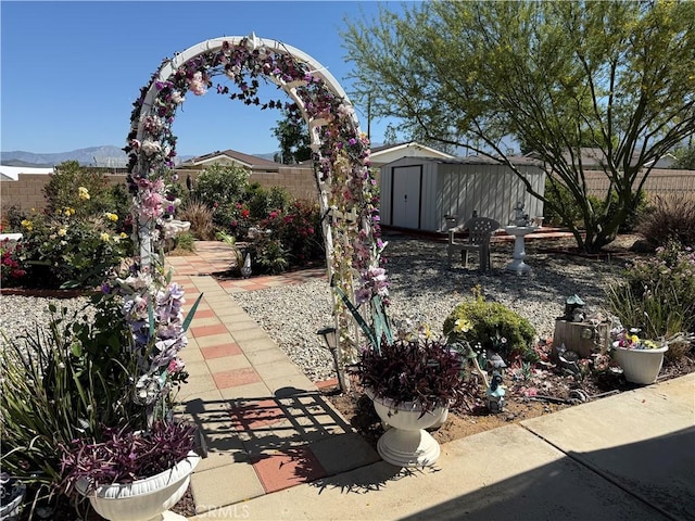 34662 Turner Ln, Yucaipa, CA 92399 - fenced backyard with a shed, an outbuilding, and a mountain view