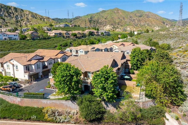 aerial view of residential area with a mountain backdrop