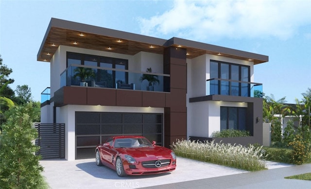 1411 Coolidge Ave, Pasadena, CA 91104 - modern home featuring driveway, a balcony, stucco siding, and an attached garage