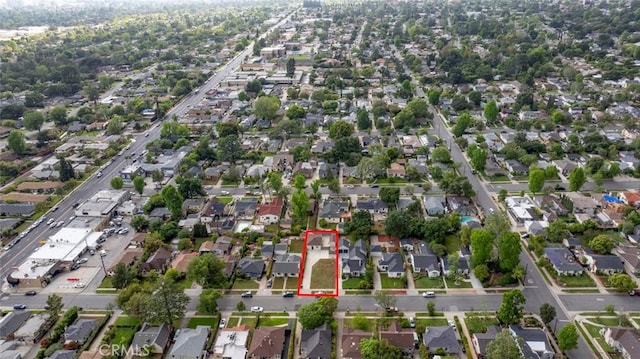 1411 Coolidge Ave, Pasadena, CA 91104 - aerial view of property and surrounding area featuring property parcel outlined and nearby suburban area