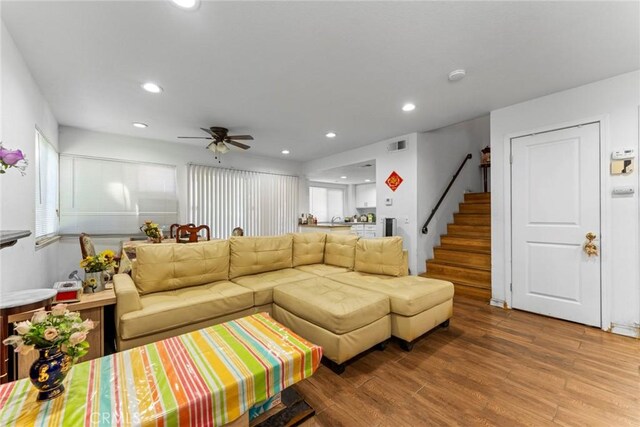 14881 Hawthorne Ave, Fontana, CA 92335 - living room with stairs, ceiling fan, wood finished floors, and recessed lighting