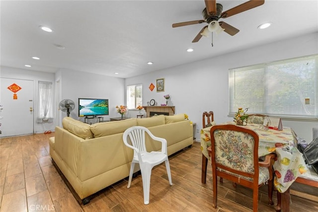14881 Hawthorne Ave, Fontana, CA 92335 - living area with light wood finished floors, recessed lighting, and a ceiling fan