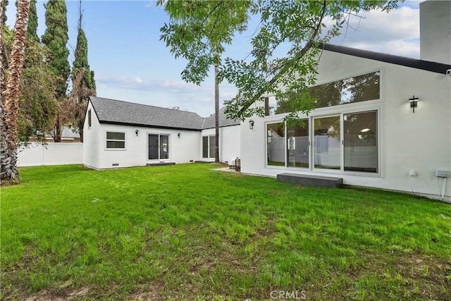 7307 Forbes Ave, Lake Balboa, CA 91406 - back of property with stucco siding and a shingled roof