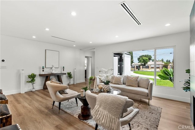 7307 Forbes Ave, Lake Balboa, CA 91406 - living area featuring recessed lighting, light wood-type flooring, and baseboards