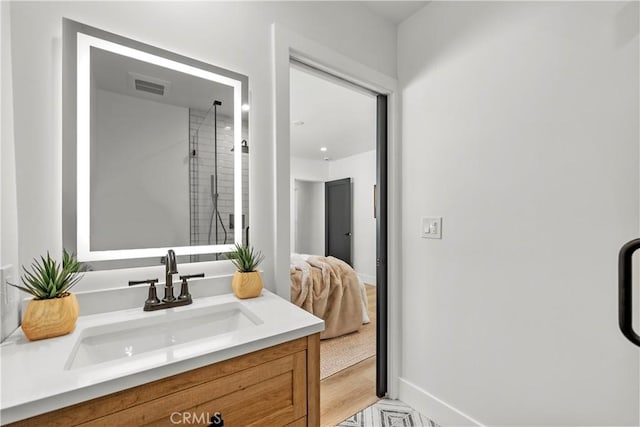 7307 Forbes Ave, Lake Balboa, CA 91406 - full bath featuring vanity, baseboards, and a shower