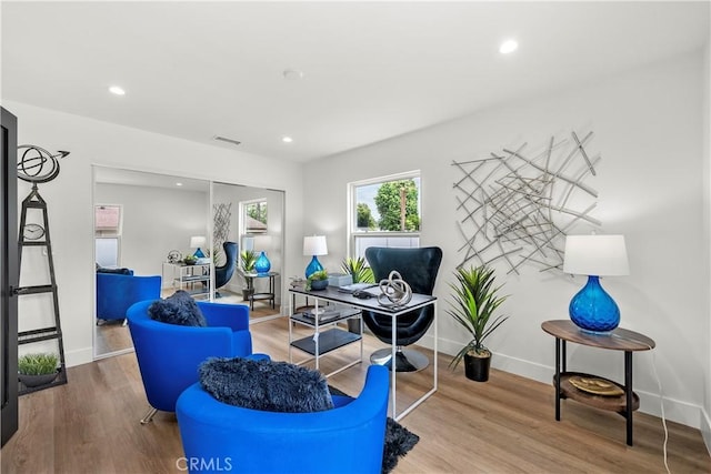 7307 Forbes Ave, Lake Balboa, CA 91406 - living room with wood finished floors, baseboards, recessed lighting, and an office area