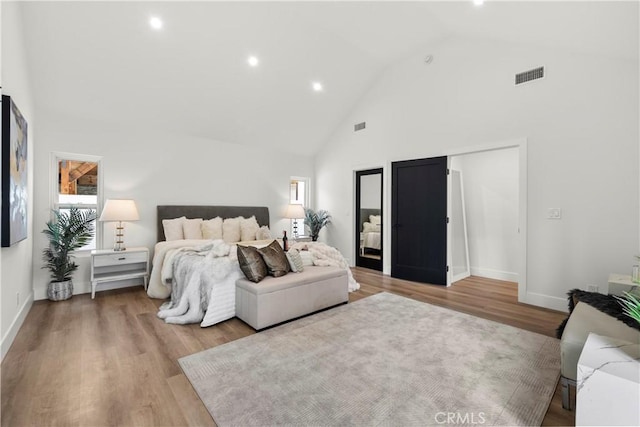 7307 Forbes Ave, Lake Balboa, CA 91406 - bedroom featuring high vaulted ceiling, light wood-type flooring, recessed lighting, and baseboards
