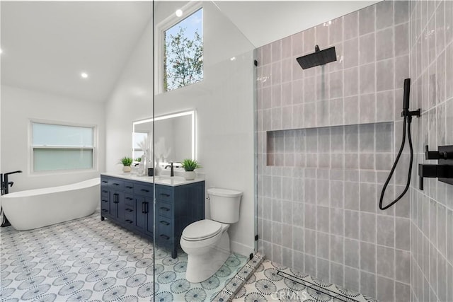 7307 Forbes Ave, Lake Balboa, CA 91406 - full bath with vanity, tiled shower, a soaking tub, toilet, and high vaulted ceiling