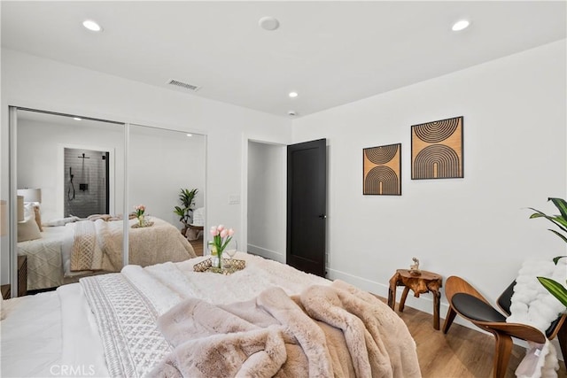 7307 Forbes Ave, Lake Balboa, CA 91406 - bedroom with recessed lighting, a closet, wood finished floors, and baseboards