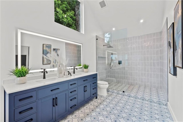 7307 Forbes Ave, Lake Balboa, CA 91406 - full bathroom with double vanity, a walk in shower, and toilet