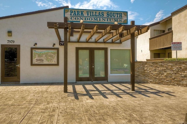 1307 Caminito Gabaldon Unit B, San Diego, CA 92108 - doorway to property featuring stucco siding