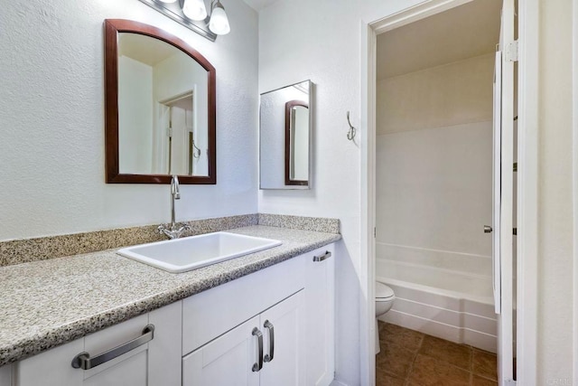 1307 Caminito Gabaldon Unit B, San Diego, CA 92108 - full bathroom featuring toilet, vanity, tile patterned flooring, and shower / bathtub combination