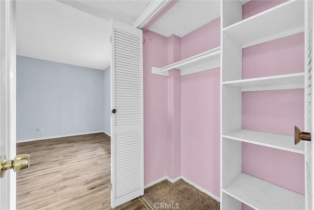 1735 E Washington St Unit B28, Colton, CA 92324 - spacious closet with wood finished floors