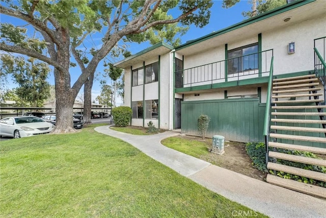 1735 E Washington St Unit B28, Colton, CA 92324 - view of building exterior featuring stairs