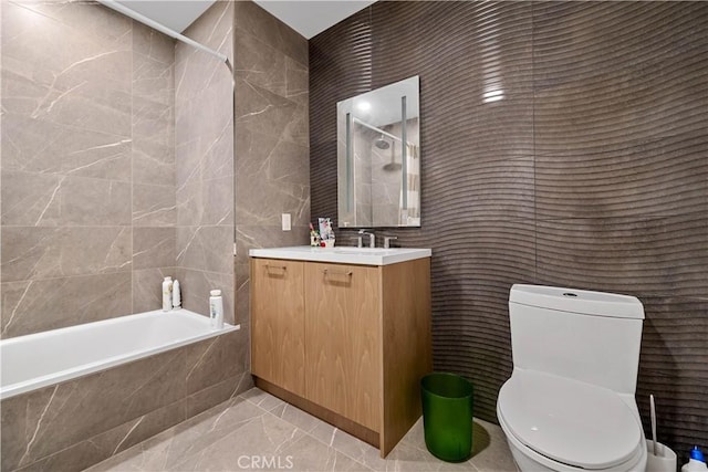 400 S Broadway Unit 2004, Los Angeles, CA 90013 - full bath with toilet, tile walls, vanity, marble finish floors, and tiled shower / bath combo
