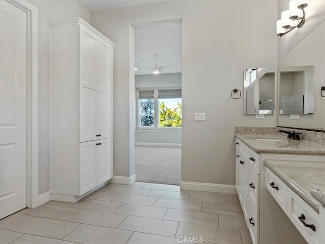 920 Trail View Pl, Nipomo, CA 93444 - bathroom featuring baseboards, vanity, and a ceiling fan