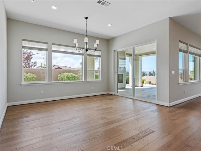 920 Trail View Pl, Nipomo, CA 93444 - unfurnished dining area featuring a chandelier, healthy amount of natural light, wood finished floors, baseboards, and recessed lighting