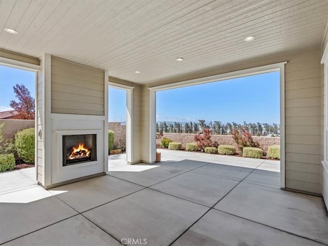 920 Trail View Pl, Nipomo, CA 93444 - view of patio / terrace with a lit fireplace