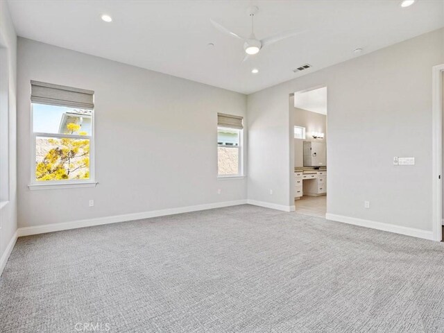 920 Trail View Pl, Nipomo, CA 93444 - spare room with light carpet, ceiling fan, baseboards, and recessed lighting