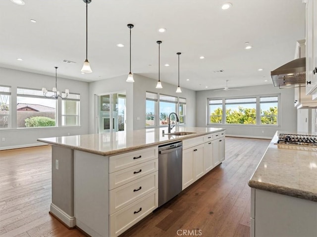 920 Trail View Pl, Nipomo, CA 93444 - kitchen featuring appliances with stainless steel finishes, a sink, wood-type flooring, white cabinets, and recessed lighting