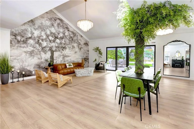 20139 Lake Canyon Dr, Walnut, CA 91789 - dining space featuring an accent wall, wood finished floors, a chandelier, ornamental molding, and arched walkways