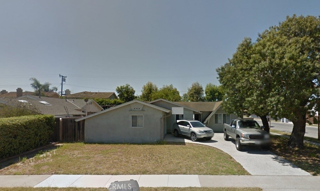 5752 Abraham Ave, Westminster, CA 92683 - view of front of property featuring concrete driveway and stucco siding