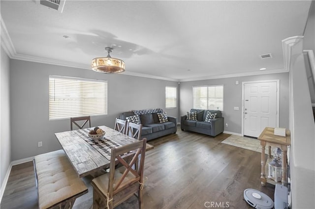 19883 San Juan Capistrano Ct, Riverside, CA 92508 - dining space featuring ornamental molding and wood finished floors