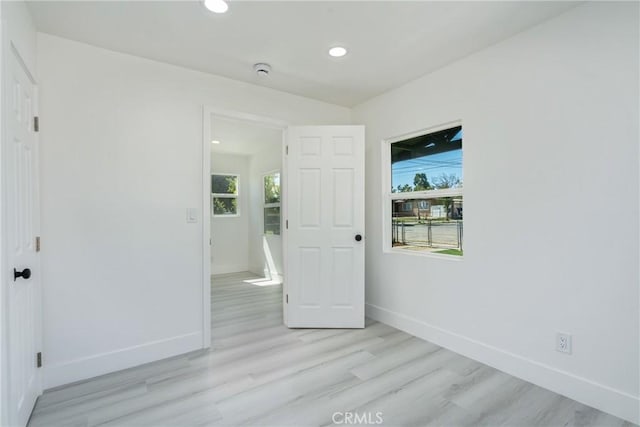 957 W 14th St, San Bernardino, CA 92411 - spare room with light wood-style flooring, plenty of natural light, baseboards, and recessed lighting