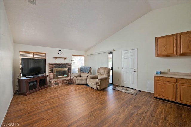 35823 48th St E, Palmdale, CA 93552 - living room featuring a fireplace, high vaulted ceiling, and dark wood-style flooring