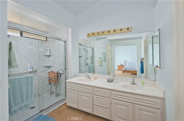 35823 48th St E, Palmdale, CA 93552 - ensuite bathroom featuring double vanity and a shower stall