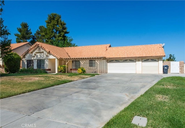35823 48th St E, Palmdale, CA 93552 - ranch-style house featuring a garage, driveway, a front lawn, stucco siding, and a tile roof