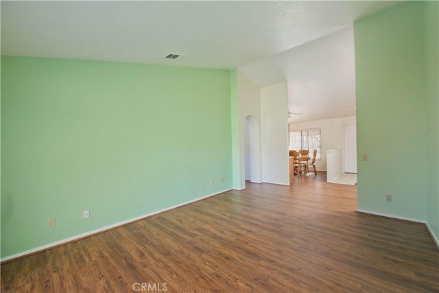 35823 48th St E, Palmdale, CA 93552 - empty room featuring dark wood-style floors and baseboards