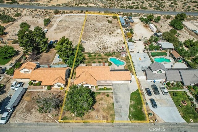35823 48th St E, Palmdale, CA 93552 - aerial overview of property's location with a pool area and property boundaries highlighted