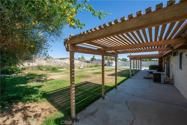 35823 48th St E, Palmdale, CA 93552 - view of patio with central AC and a pergola