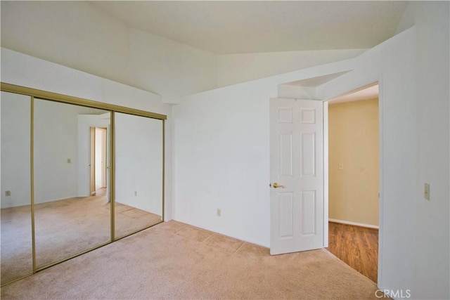 35823 48th St E, Palmdale, CA 93552 - unfurnished bedroom featuring carpet, vaulted ceiling, and a closet