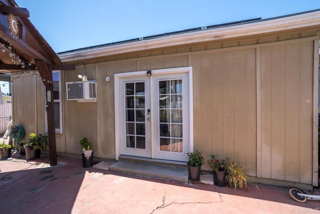 property entrance with french doors and a patio area