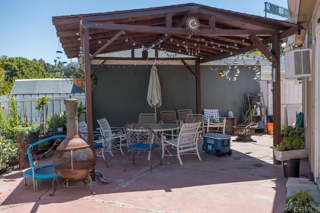 view of patio / terrace with a gazebo and outdoor dining area