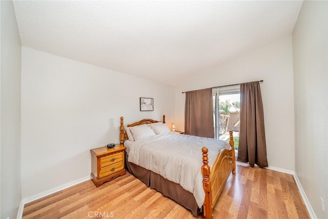 3628 Grizzley Creek Ct, Ontario, CA 91761 - bedroom with lofted ceiling, light wood-style flooring, and baseboards