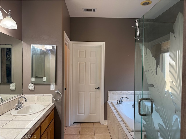 23618 Canyon Lake Dr N, Canyon Lake, CA 92587 - bathroom with vanity, a stall shower, a bath, and tile patterned floors