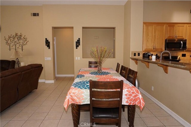 23618 Canyon Lake Dr N, Canyon Lake, CA 92587 - dining space featuring light tile patterned flooring and baseboards