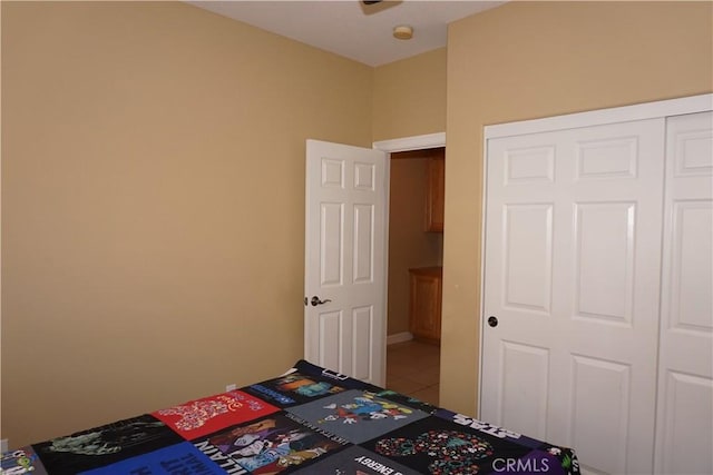 23618 Canyon Lake Dr N, Canyon Lake, CA 92587 - unfurnished bedroom with tile patterned floors and a closet