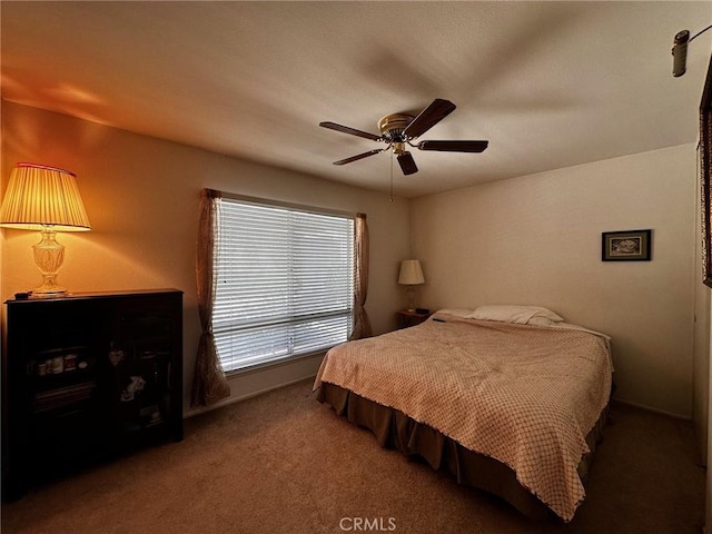 19628 Pine Valley Ave, Porter Ranch, CA 91326 - carpeted bedroom with a ceiling fan and baseboards