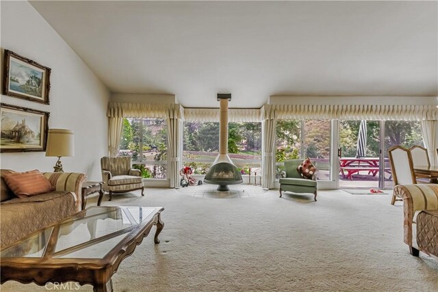 19628 Pine Valley Ave, Porter Ranch, CA 91326 - carpeted living room with a wood stove