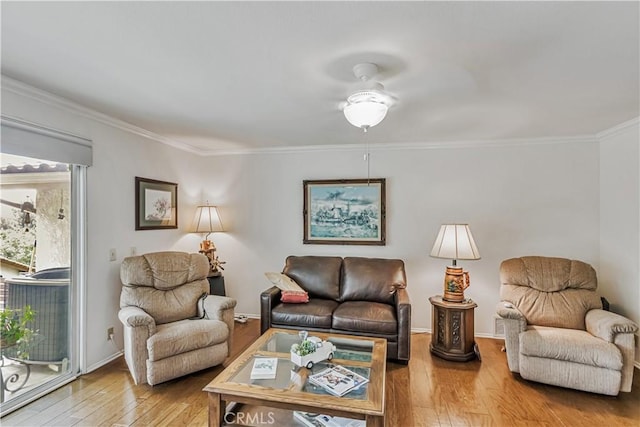 19628 Pine Valley Ave, Porter Ranch, CA 91326 - living area featuring hardwood / wood-style flooring, ornamental molding, baseboards, and a ceiling fan