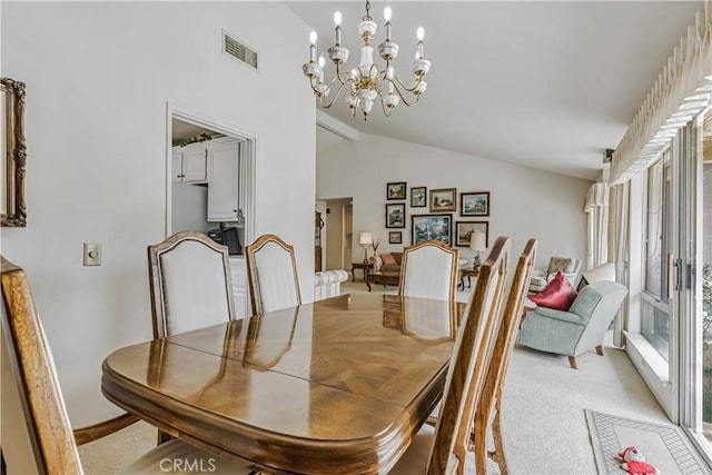 19628 Pine Valley Ave, Porter Ranch, CA 91326 - dining space featuring lofted ceiling, light colored carpet, and a chandelier