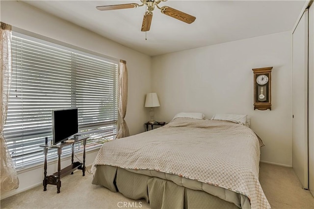 19628 Pine Valley Ave, Porter Ranch, CA 91326 - bedroom with light carpet, baseboards, a closet, and a ceiling fan