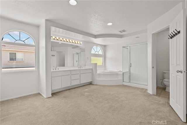5564 Capri Ct, Palmdale, CA 93552 - bathroom featuring a stall shower, carpet, double vanity, a garden tub, and toilet